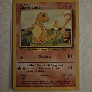 Pokemon Charmander Card with Orange and Yellow